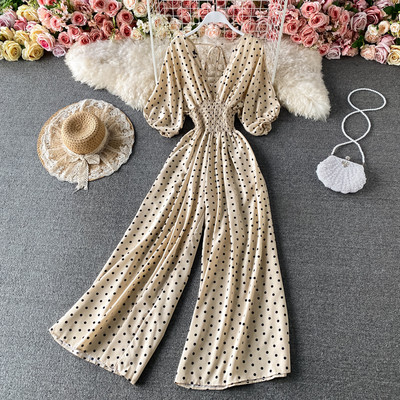 Salopetă largă de damă cu decolteu cu buline