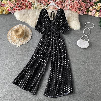 Salopetă largă de damă cu decolteu cu buline