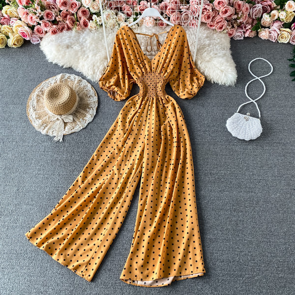 Salopetă largă de damă cu decolteu cu buline