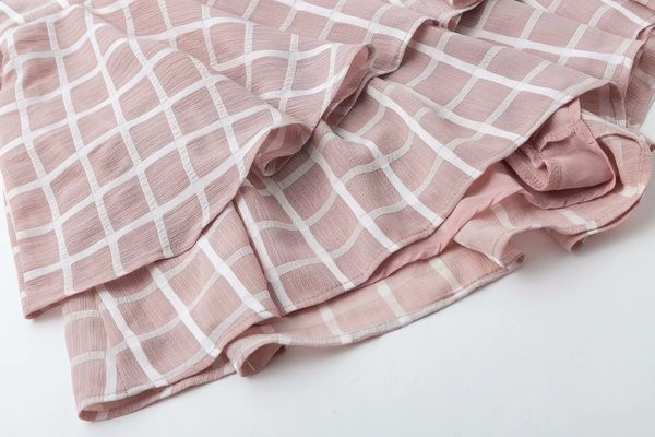 Salopeta scurta asimetrica in carouri cu centura