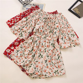 Γυναικεία ολόσωμη φόρμα με κοντά μανίκια και κορδόνια