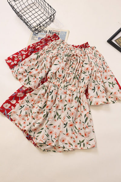 Γυναικεία ολόσωμη φόρμα με κοντά μανίκια και κορδόνια