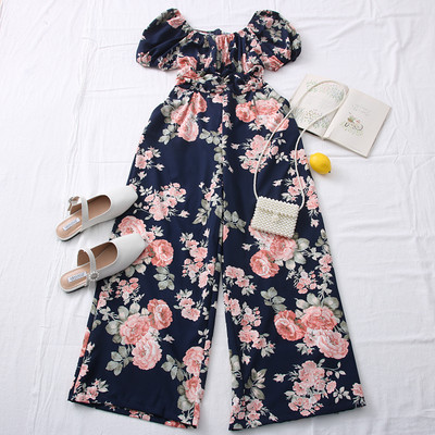 Casual γυναικεία ολόσωμη φόρμα με λουλουδάτο μοτίβο και στρογγυλή λαιμόκοψη