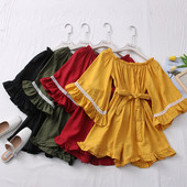 Salopeta de dama moderna cu centura si decolteu barca