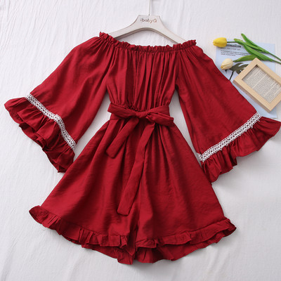 Salopeta de dama moderna cu centura si decolteu barca