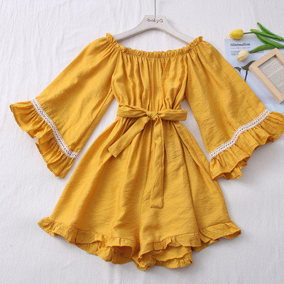 Salopeta de dama moderna cu centura si decolteu barca