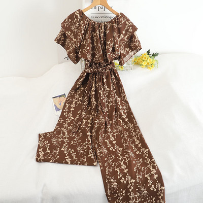 Ženski dugi kombinezon sa cvjetnim motivima i pojasom