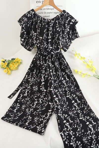 Ženski dugi kombinezon sa cvjetnim motivima i pojasom