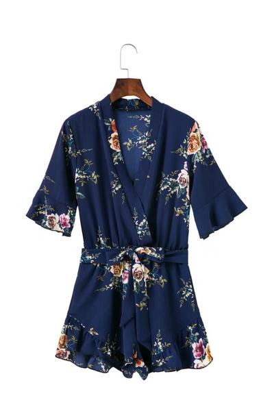 Κοντή γυναικεία ολόσωμη φόρμα με βολάν και βαθύ ντεκολτε