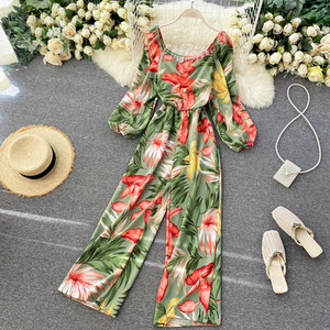 Salopeta de dama colorata cu centura si decolteu rotund