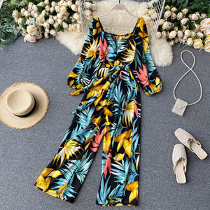 Salopeta de dama colorata cu centura si decolteu rotund