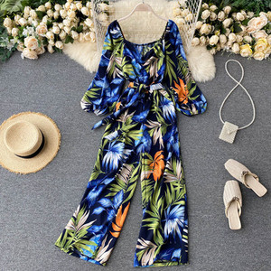 Salopeta de dama colorata cu centura si decolteu rotund