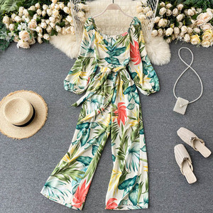 Salopeta de dama colorata cu centura si decolteu rotund