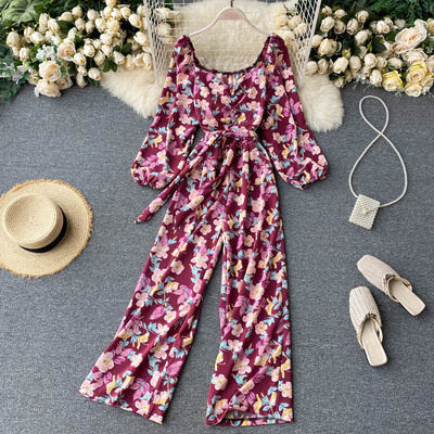 Salopeta de dama colorata cu centura si decolteu rotund