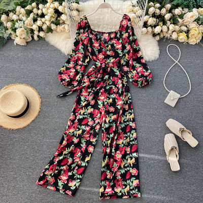 Salopeta de dama colorata cu centura si decolteu rotund