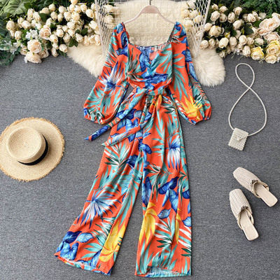 Salopeta de dama colorata cu centura si decolteu rotund