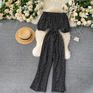 Μοντέρνα γυναικεία καθημερινή ολόσωμη φόρμα με ντεκολτέ βάρκα και 3/4 μανίκια