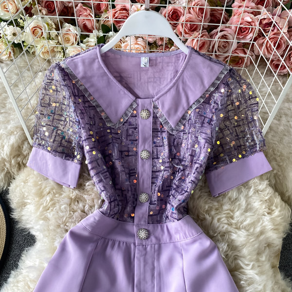 Ženski elegantni kombinezon sa sjajnim efektom i kratkim rukavima