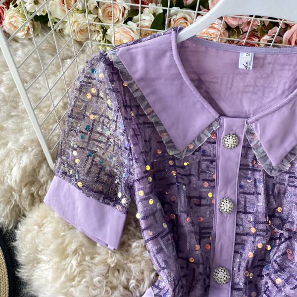 Ženski elegantni kombinezon sa sjajnim efektom i kratkim rukavima