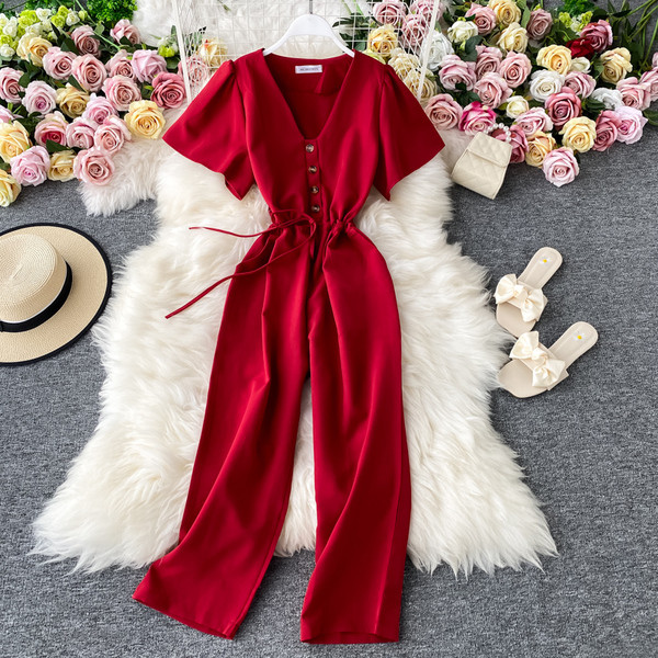 Salopetă lungă de damă cu cravate și decolteu spitz