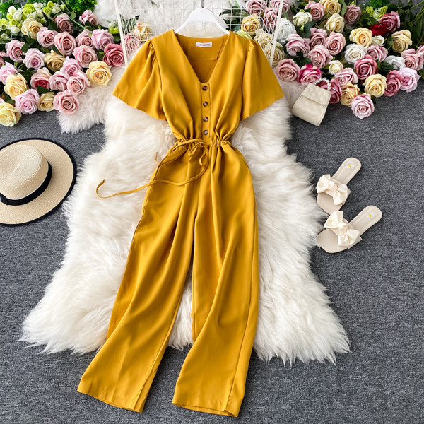 Salopetă lungă de damă cu cravate și decolteu spitz