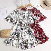 Salopetă de damă modernă cu decolteu spitz și mâneci largi