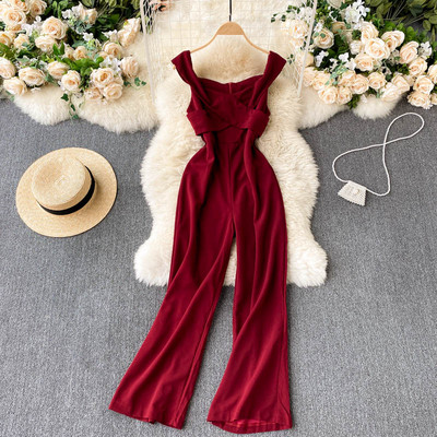 Ženski dugi kombinezon s okruglim izrezom i širokim naramenicama