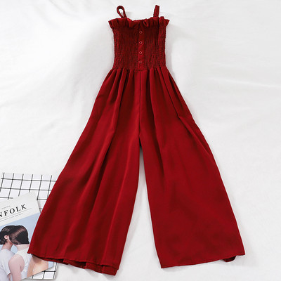 Ženski ležerni kombinezon s gumbima i tankim naramenicama