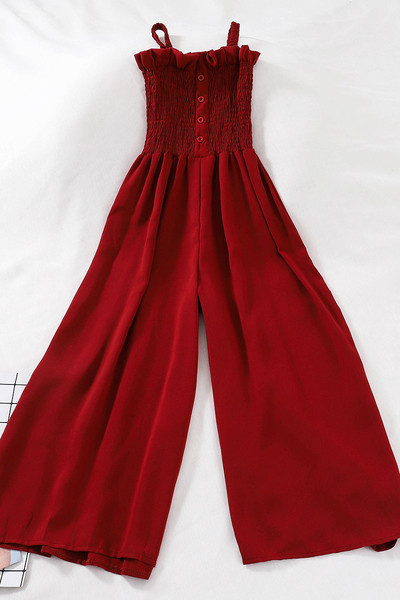 Ženski ležerni kombinezon s gumbima i tankim naramenicama