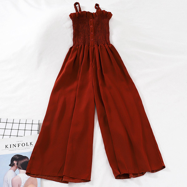 Ženski ležerni kombinezon s gumbima i tankim naramenicama