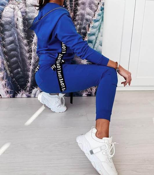 Moteriškas sportinis kelnių ir palaidinės komplektas su užtrauktuku