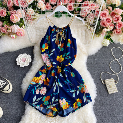 Women`s short jumpsuit with floral pattern and elastic