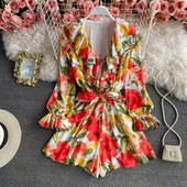 Γυναικεία ολόσωμη φόρμα με βολάν και λαιμόκοψη