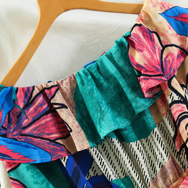 Salopetă casual de damă cu model floral și mâneci 3/4