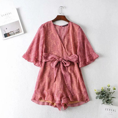 Νέο μοντέλο κοντή  ολόσωμη φόρμα με βαθύ ντεκολτέ