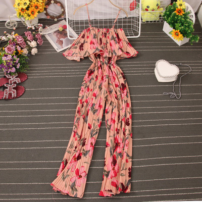 Ženski kombinezon s tankim naramenicama i cvjetnim motivima