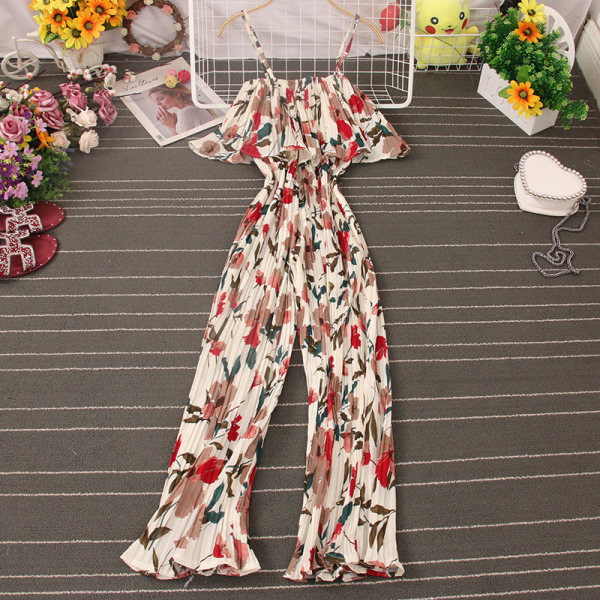 Ženski kombinezon s tankim naramenicama i cvjetnim motivima