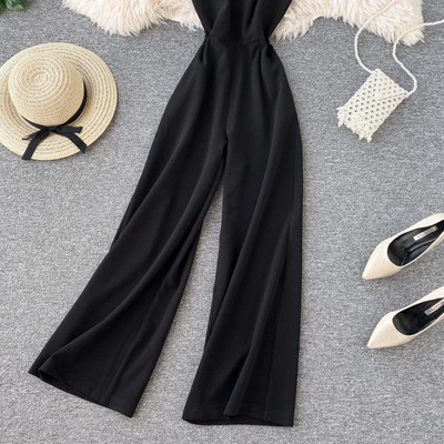 Salopeta de dama moderna cu bretele si picioare late in negru