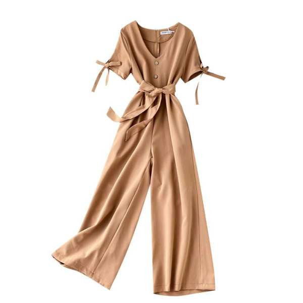 Salopetă modernă de damă, cu decolteu și curea spitz