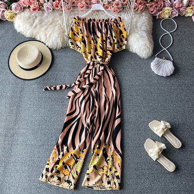 Salopetă de damă colorată cu legături în talie