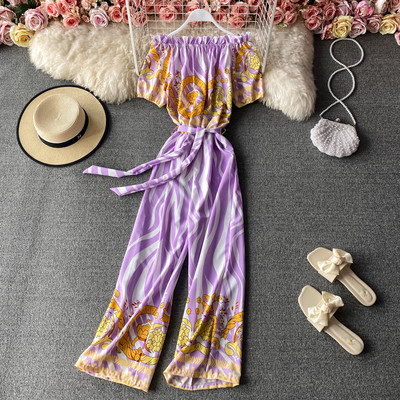 Salopetă de damă colorată cu legături în talie