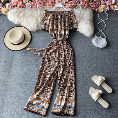 Salopetă de damă colorată cu legături în talie