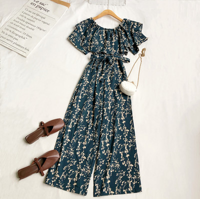 Γυναικεία μοντέρνα ολόσωμη φόρμα με λουλουδάτο μοτίβο και ζώνη στη μέση