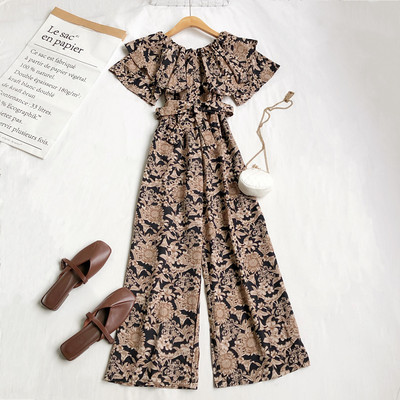 Γυναικεία μοντέρνα ολόσωμη φόρμα με λουλουδάτο μοτίβο και ζώνη στη μέση