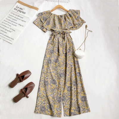 Γυναικεία μοντέρνα ολόσωμη φόρμα με λουλουδάτο μοτίβο και ζώνη στη μέση