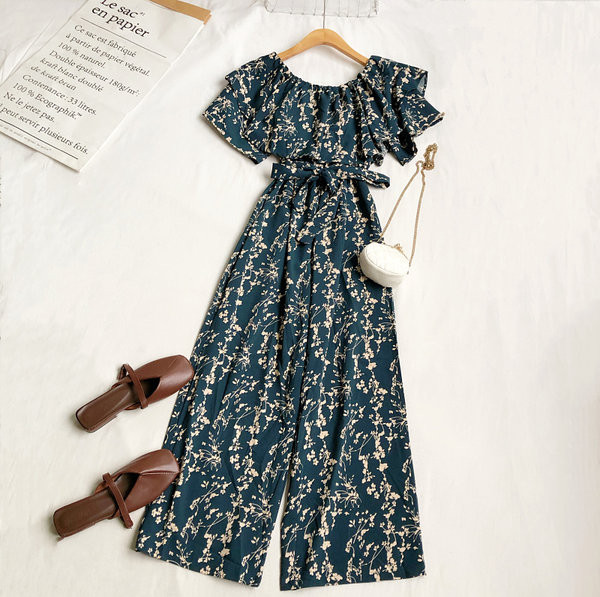 Γυναικεία μοντέρνα ολόσωμη φόρμα με λουλουδάτο μοτίβο και ζώνη στη μέση