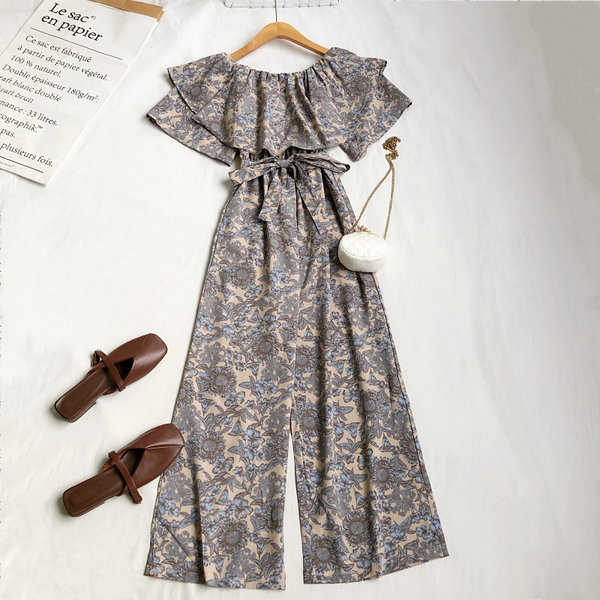 Γυναικεία μοντέρνα ολόσωμη φόρμα με λουλουδάτο μοτίβο και ζώνη στη μέση