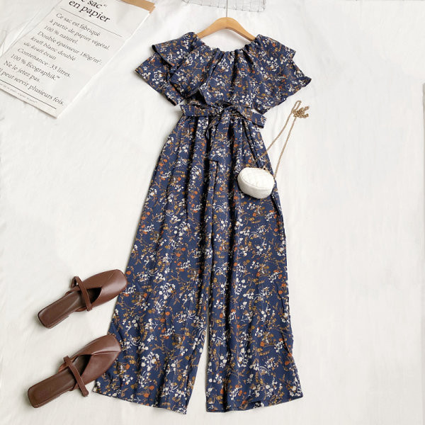 Γυναικεία μοντέρνα ολόσωμη φόρμα με λουλουδάτο μοτίβο και ζώνη στη μέση