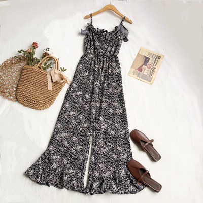 Salopetă elegantă de damă cu model floral și bretele subțiri