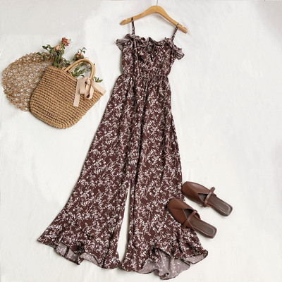 Salopetă elegantă de damă cu model floral și bretele subțiri